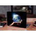 Наклейка на ноутбук - Earth in hands Наклейка на ноутбук - Earth in hands